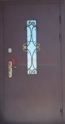 Металлическая дверь со стеклом и ковкой ДСК-77 в Истре